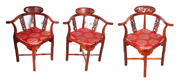 Appraisal: Group of three carved Chinese wishbone chairs in mahogany finish