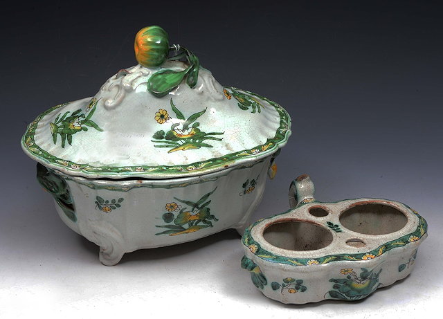 Appraisal: A FRENCH FAIENCE TUREEN AND COVER with green and yellow