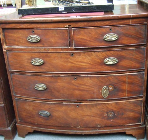 Appraisal: A th century mahogany bowfront chest of two short and