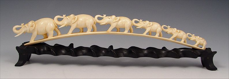 Appraisal: CARVED IVORY ELEPHANT BRIDGE elephants The ivory is '' long