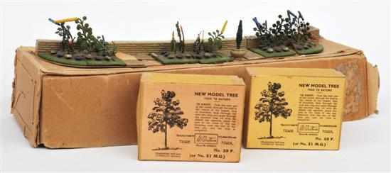 Appraisal: Two Britains F Trees in buff boxes with illustrated lift