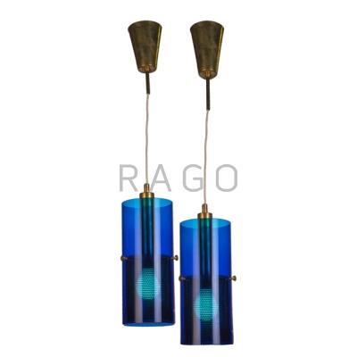 Appraisal: AAGE HERLOW Pair of pendant fixtures Denmark s Brass glass