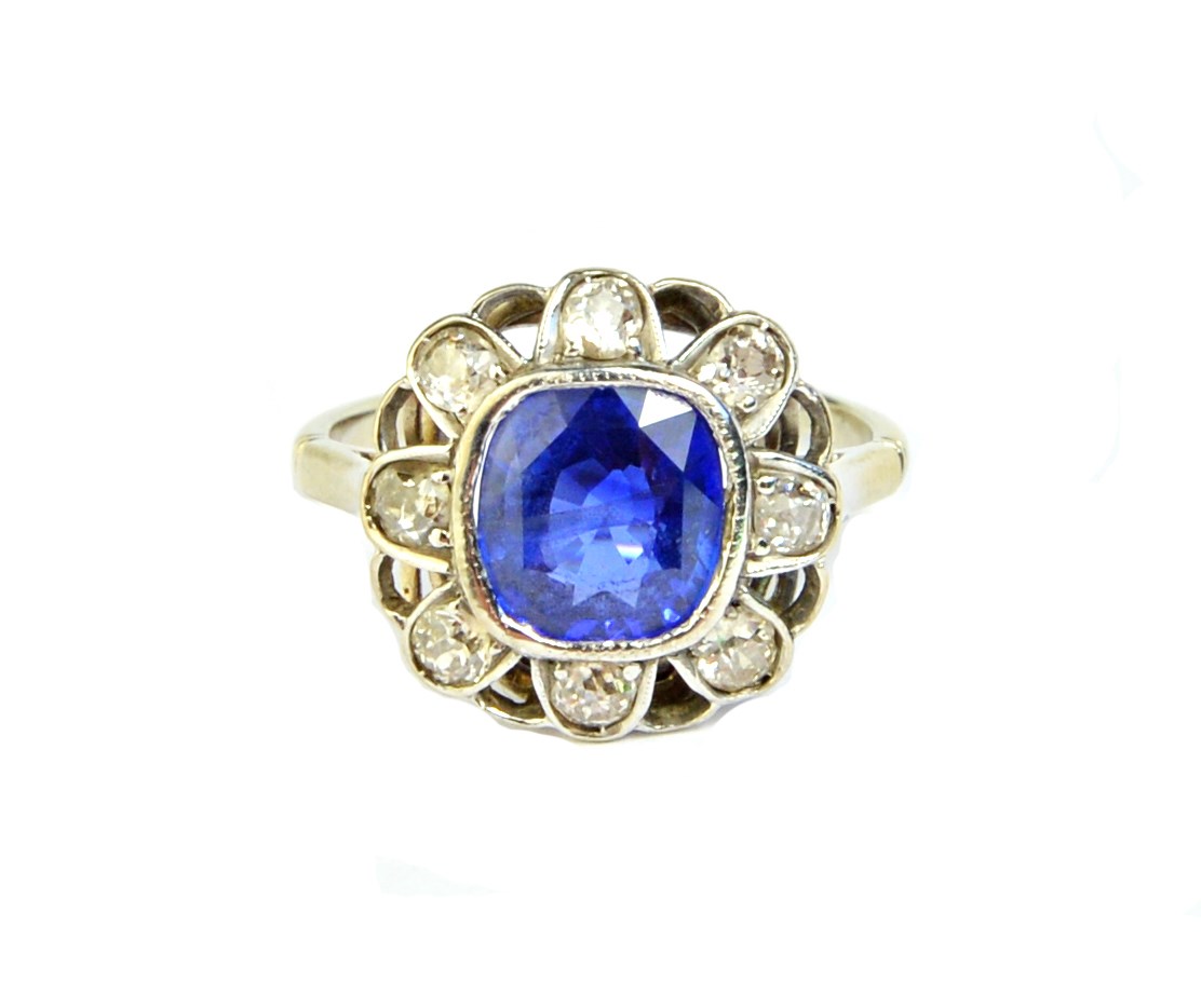 Appraisal: A white gold sapphire and diamond set cluster ring mounted