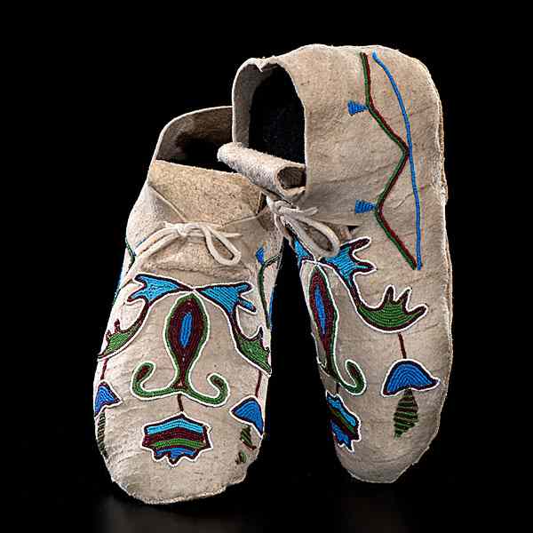 Appraisal: Crow Beaded Hide Moccasins sinew-sewn elk and beaded using colors