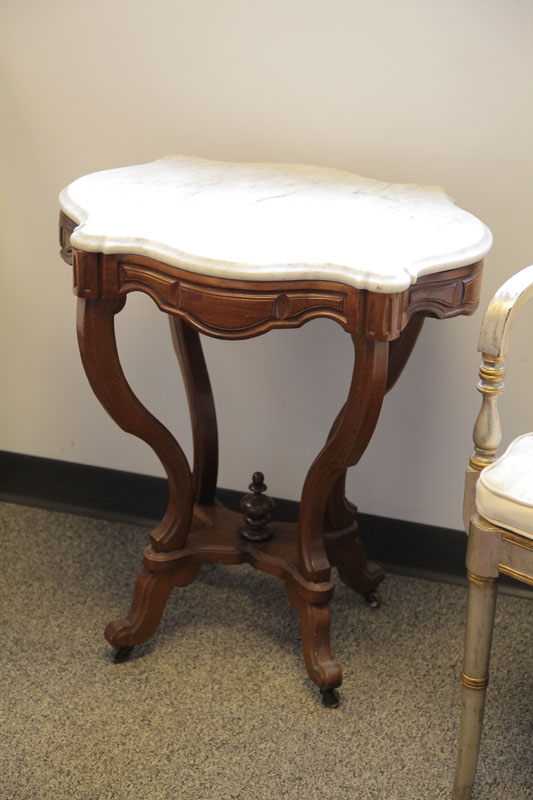 Appraisal: VICTORIAN SIDE TABLE Turtle shaped marble top table on a