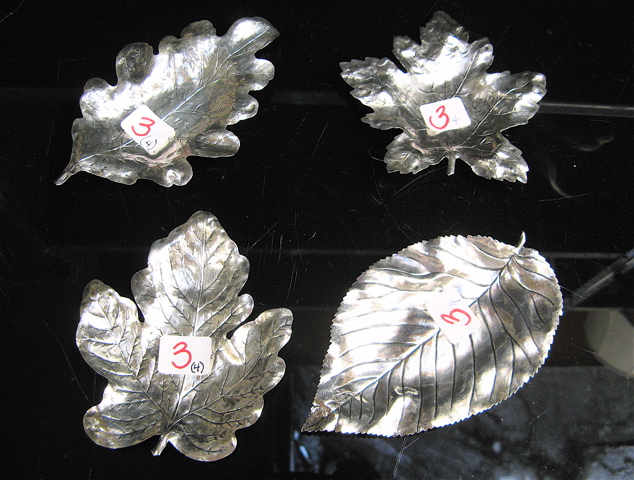 Appraisal: FOUR STERLING SILVER SHALLOW DISHES in the form of tree