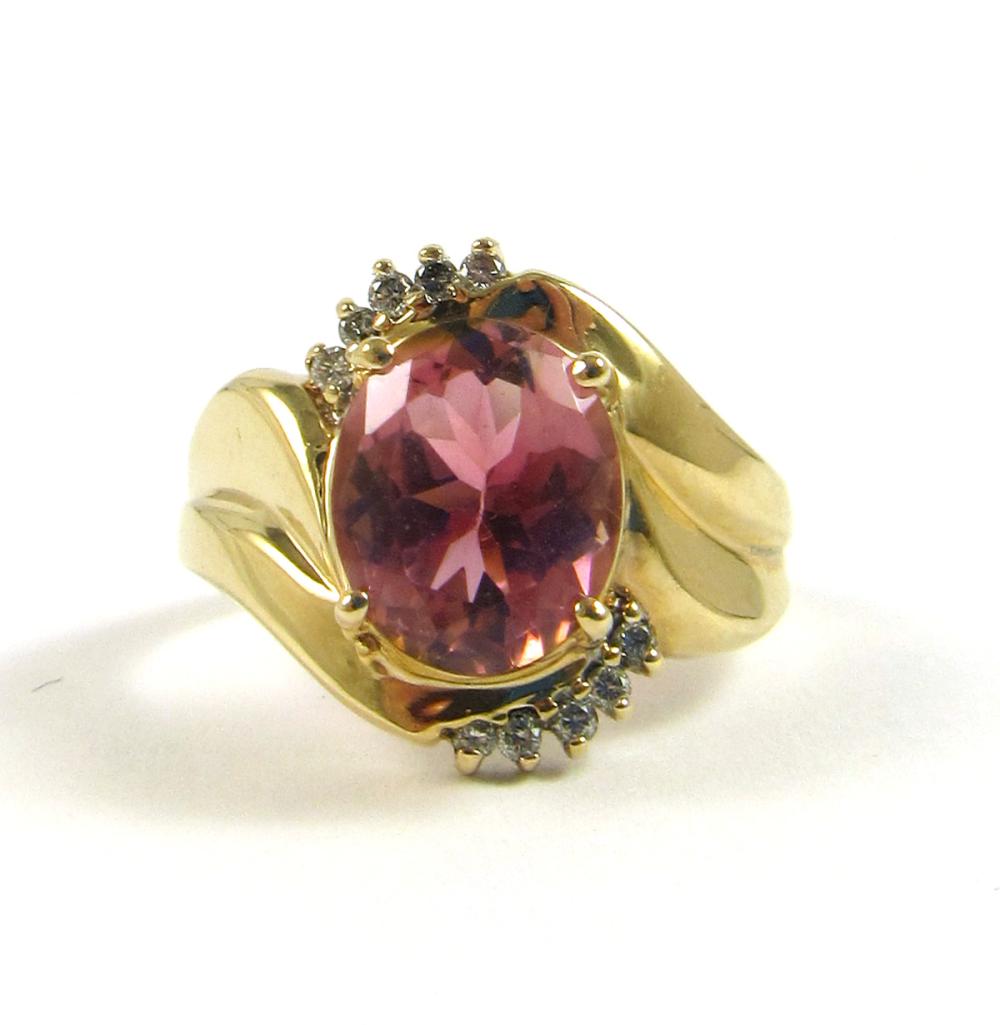 Appraisal: PINK TOURMALINE DIAMOND AND FOURTEEN KARAT GOLD RING with five