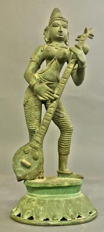 Appraisal: Southeast Asian Bronze Figure Holding Instrument Southeast Asian bronze figure