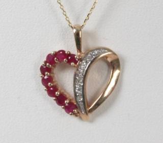 Appraisal: K DIAMOND AND RUBY PENDANT NECKLACE K YELLOW GOLD DIAMOND