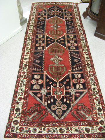 Appraisal: PERSIAN HAMADAN HALL CARPET Hamadan tribal villages region northwest Iran