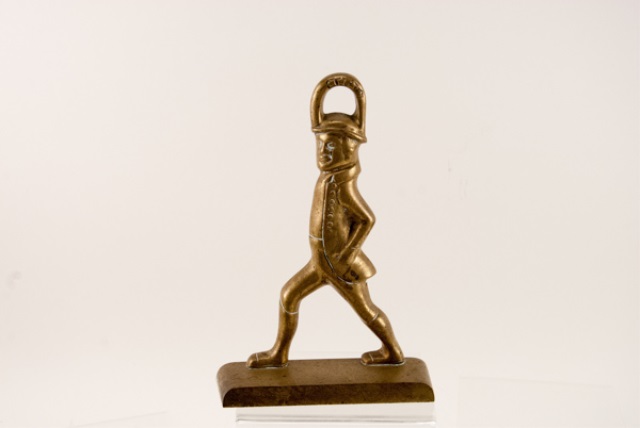 Appraisal: Brass Figural Doorstop Brass Soldier doorstop marked Williamsburg Restoration signed