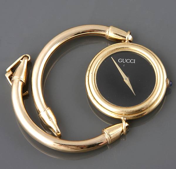 Appraisal: An k gold bracelet quartz wristwatch dial signed Gucci