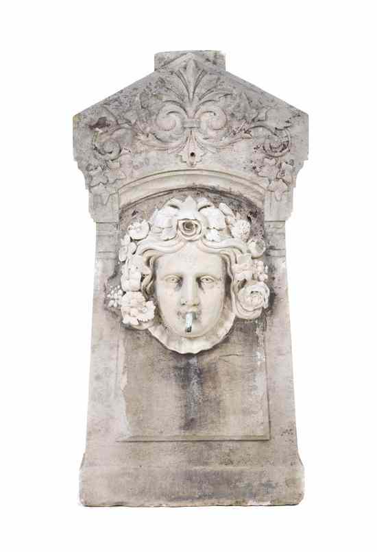 Appraisal: A Continental Limestone Fountain having a peaked top with foliate