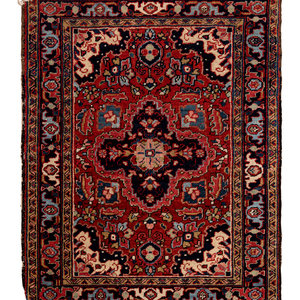 Appraisal: A Persian Wool Rug th Century feet inch x feet