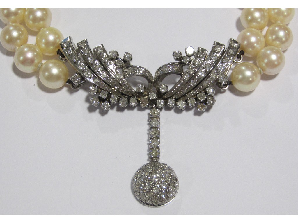 Appraisal: An Art Deco cultured pearl two strand necklace with diamond