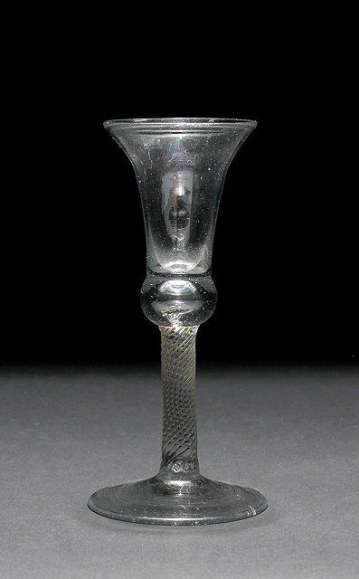 Appraisal: AN TH CENTURY CORDIAL GLASS with flaring bell shaped bowl