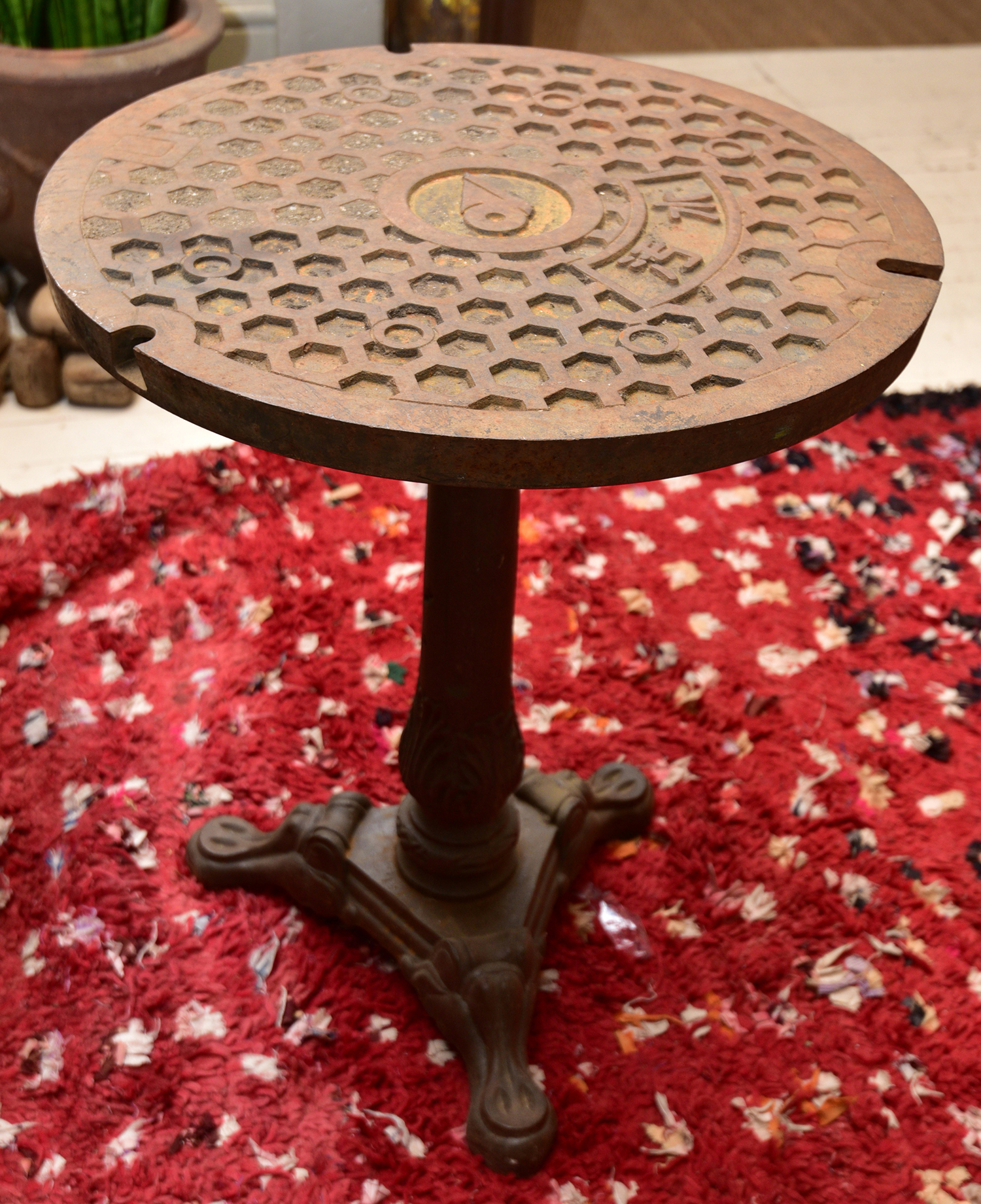 Appraisal: A JAPANESE IRON CIRCULAR TOP SIDE TABLE h x diameter