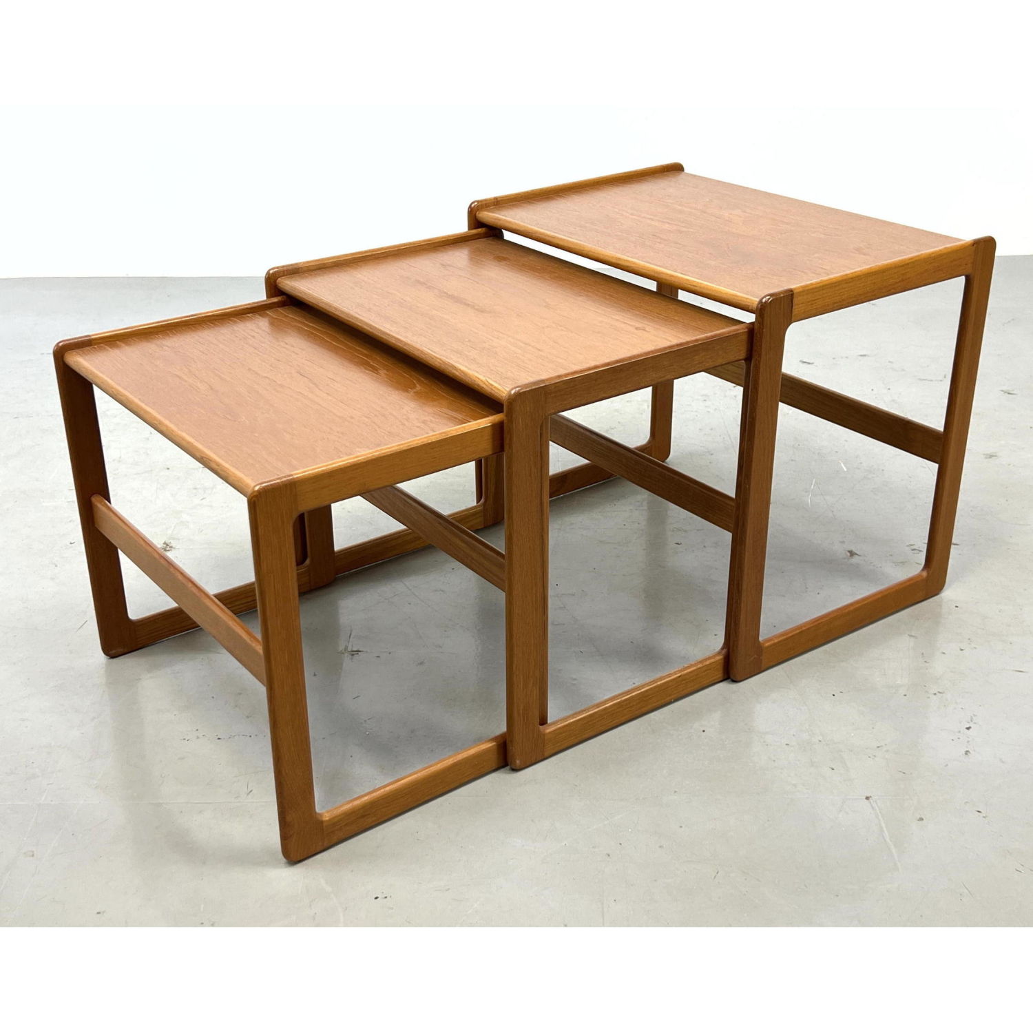 Appraisal: pc Danish modern teak nesting tables Dimensions H inches W