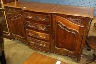 Appraisal: French Provincial style buffet French Provincial style buffet having a