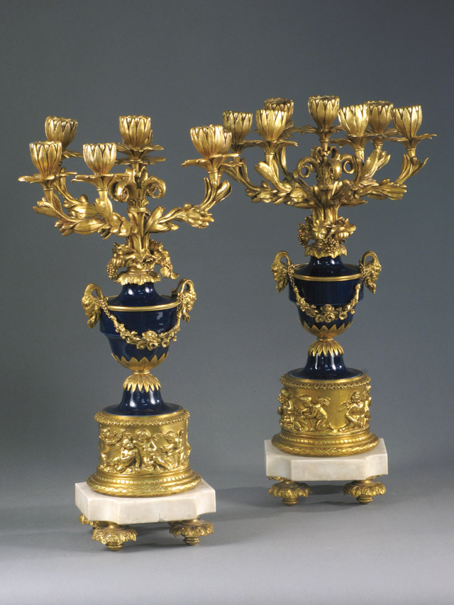 Appraisal: PAIR FRENCH GILT BRONZE COBALT BLUE CANDELABRA The -light candelabra