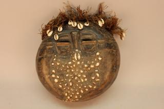 Appraisal: Antique African Carved Mask decorated with cowrie shells and hair