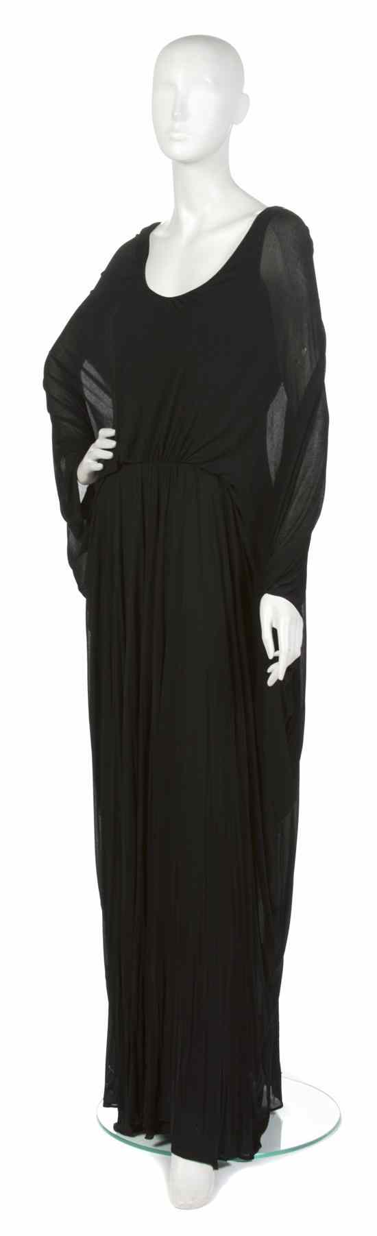 Appraisal: A Stavropoulos Black Chiffon Evening Gown exaggerated dolman sleeves scoop