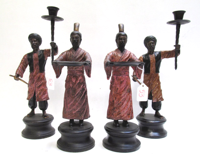 Appraisal: FOUR FIGURAL BRONZE POLYCHROME SCULPTURES two of which are candle