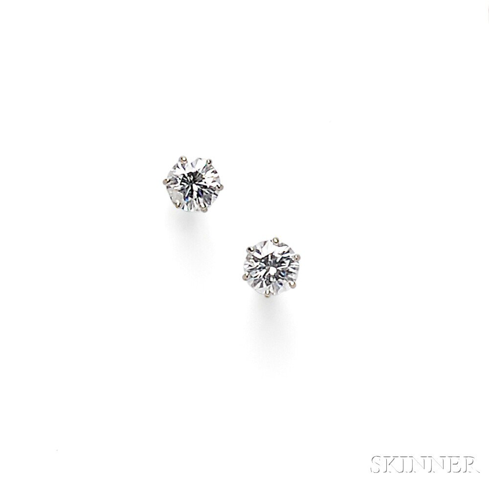 Appraisal: kt White Gold and Diamond Earstuds each set with a