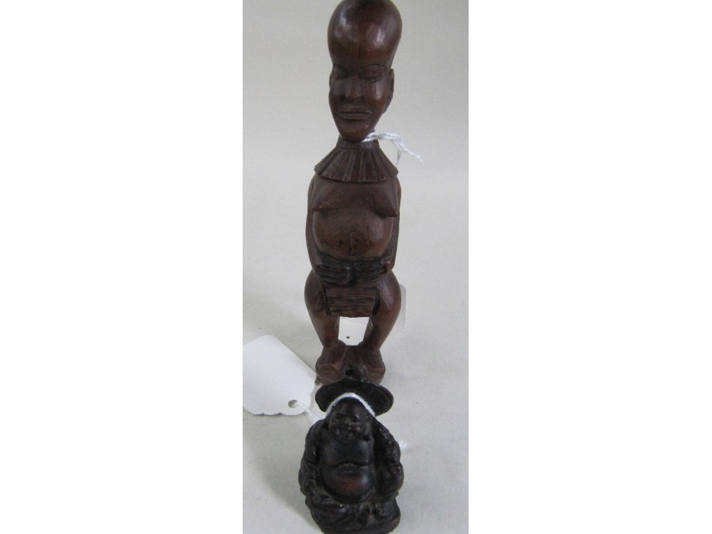 Appraisal: Lot comprising African carved hardwood fertility figure and a carved