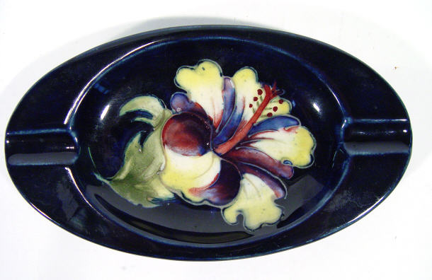 Appraisal: Moorcroft pottery ashtray hand painted and tubelined with hibiscus pattern