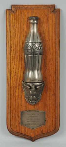 Appraisal: s Coca-Cola Bottler's Award Plaque With a silver half bottle