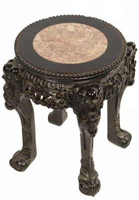 Appraisal: A Chinese carved hardwood low stand the top inset a