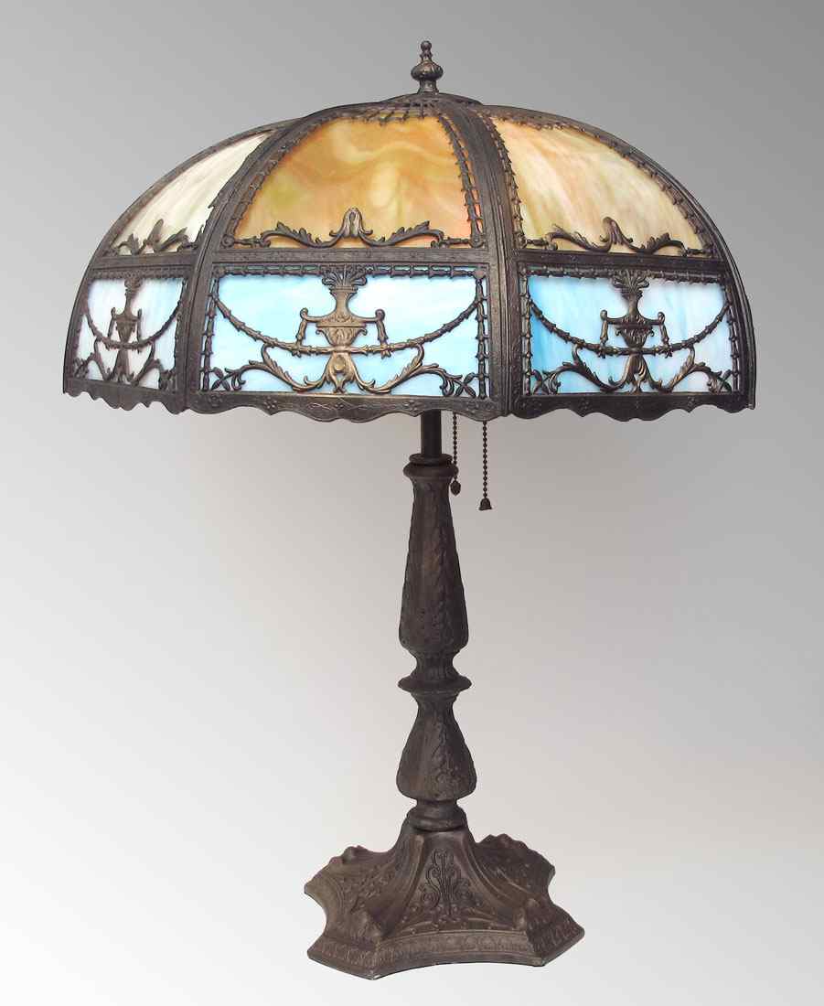 Appraisal: VINTAGE FILIGREE SLAG GLASS TABLE LAMP Domed panel shade with