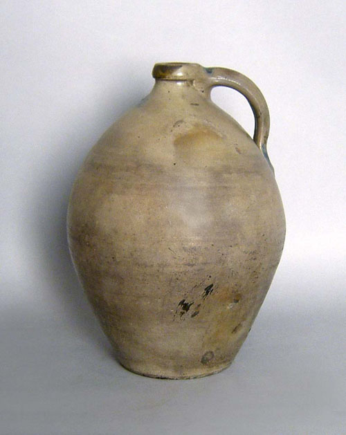 Appraisal: Two ovoid stoneware jugs th c h h together with