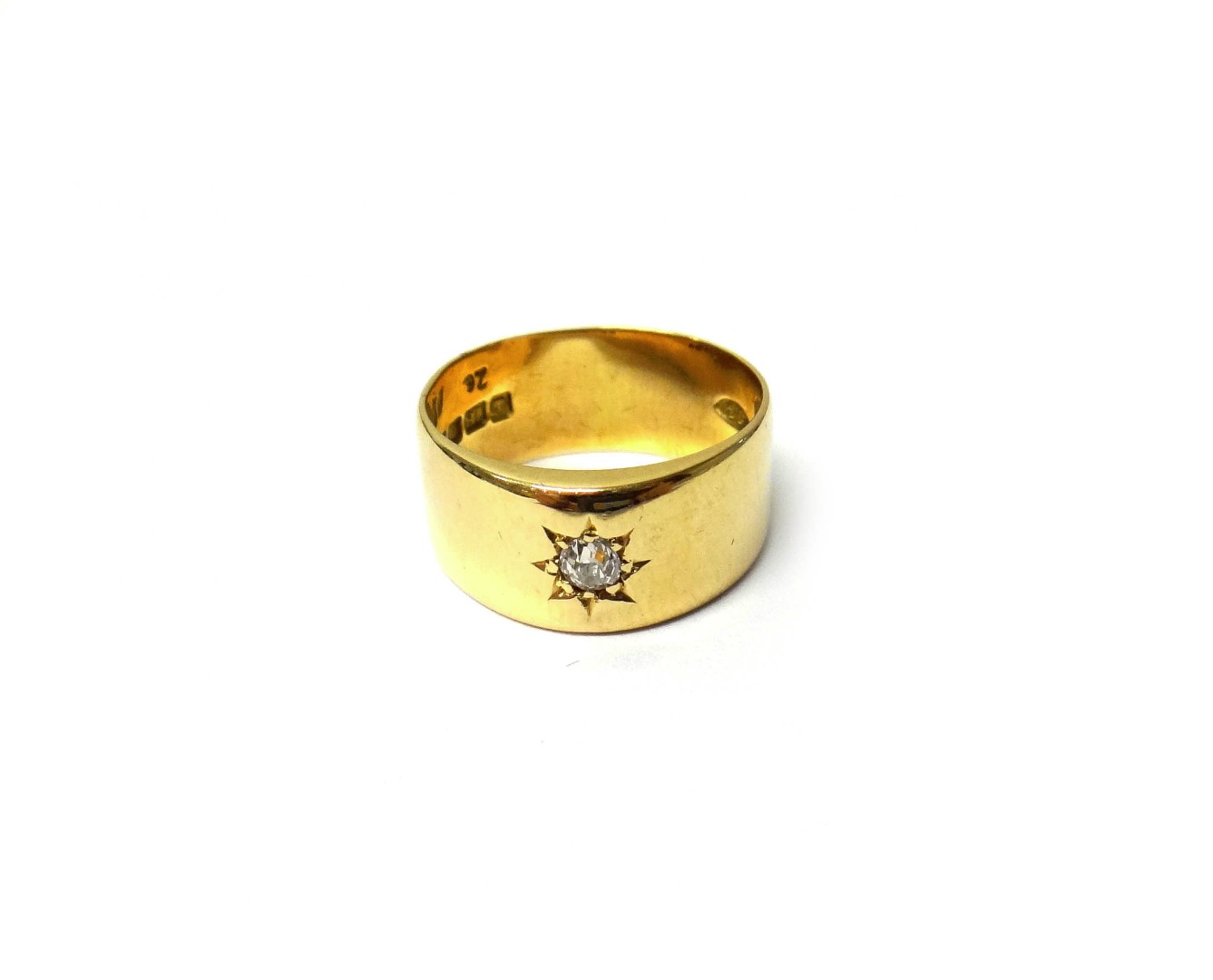 Appraisal: An ct gold and diamond set wide band ring star