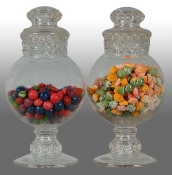 Appraisal: Lot of Dakota Globe Candy Jars Description Both jars are