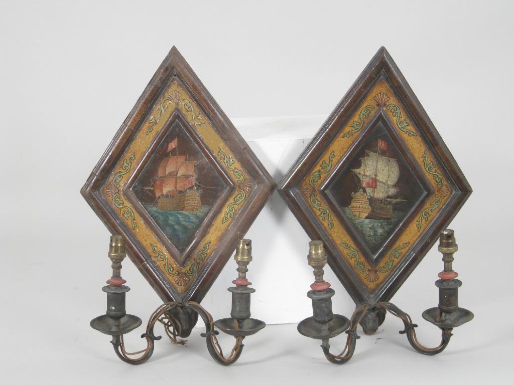 Appraisal: Pair of brass and painted wood Wall Sconces decorated ships