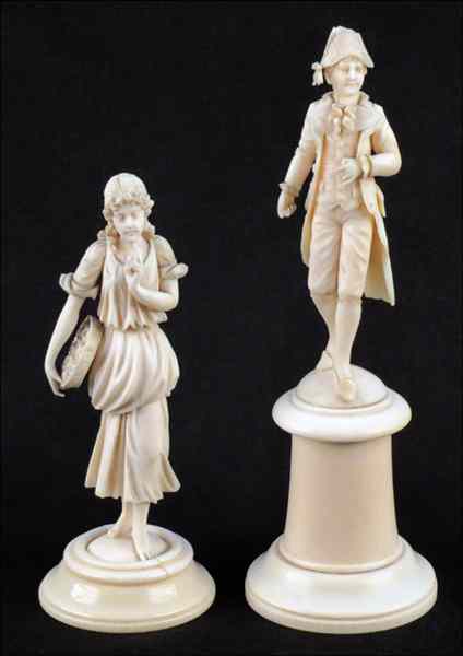 Appraisal: TWO CONTINENTAL CARVED IVORY FIGURES Comprising one figure of a