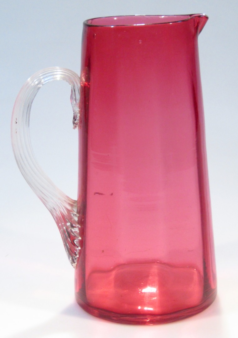 Appraisal: A thC cranberry and clear glass water jug the cylindrical