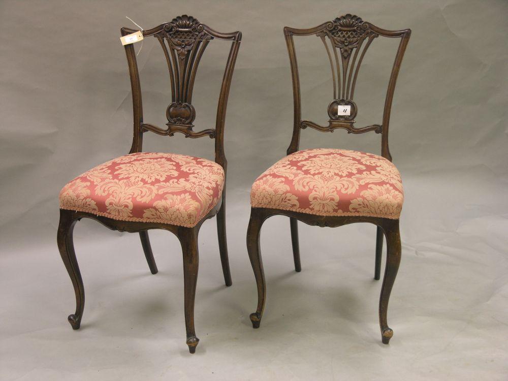 Appraisal: A pair of late Victorian mahogany drawing room single chairs