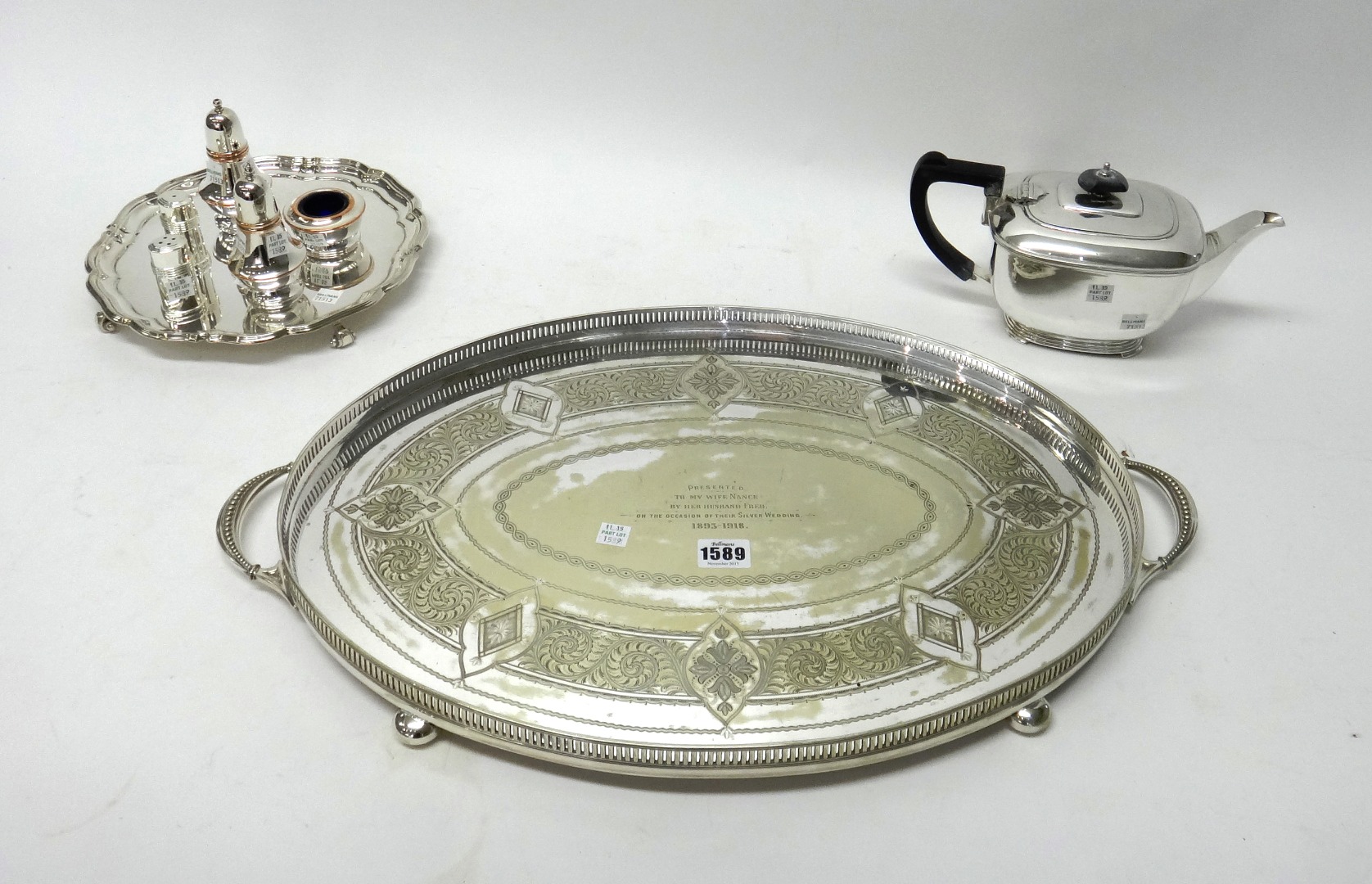 Appraisal: Plated wares comprising an oval twin handled gallery tray raised