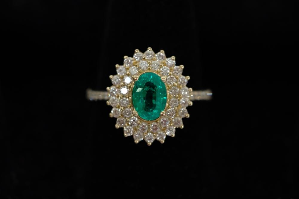 Appraisal: CT EMERALD AND DIAMOND RING SZ Carat oval cut Colombian