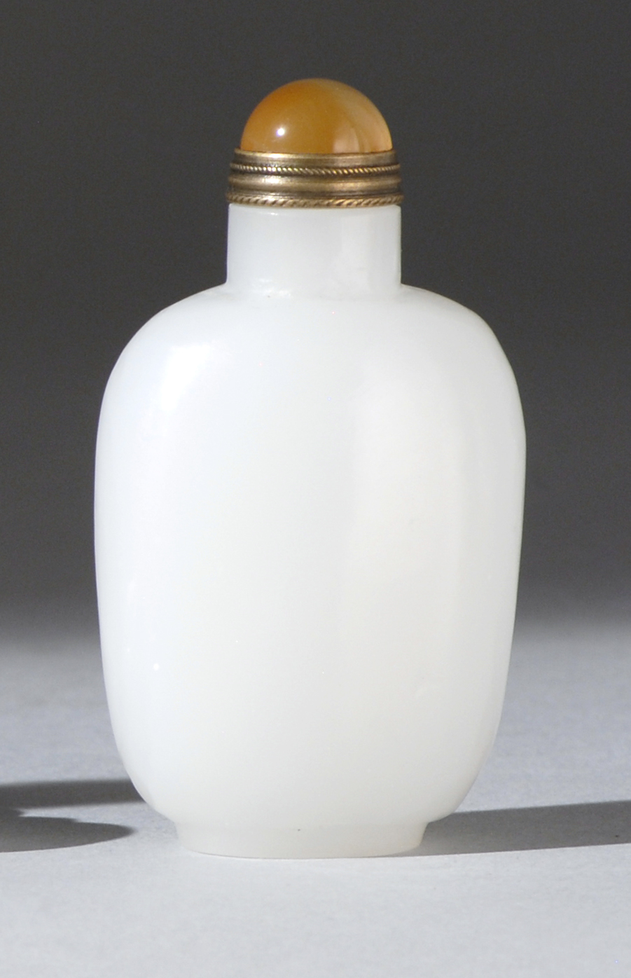 Appraisal: HETIAN WHITE JADE SNUFF BOTTLE In spade shape with pure