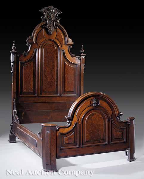 Appraisal: An American Renaissance Carved Walnut and Burled Bedstead mid- th