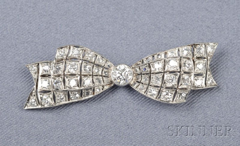 Appraisal: Art Deco Platinum and Diamond Bow Brooch set with old