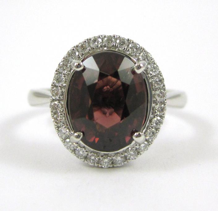 Appraisal: RED ZIRCON DIAMOND AND FOURTEEN KARAT GOLD RING The white