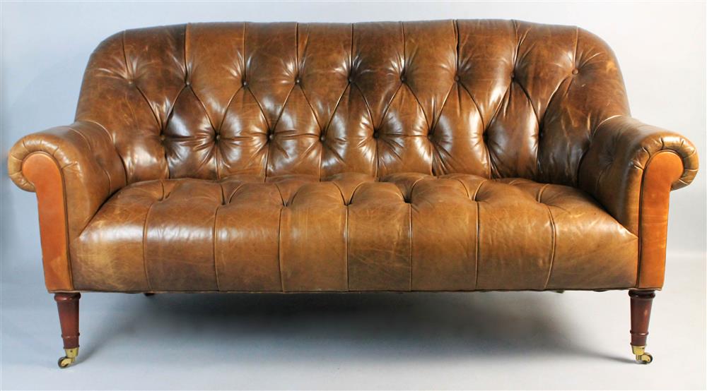 Appraisal: CARAMEL BROWN LEATHER CHESTERFIELD SETTEE of typical form tufted back