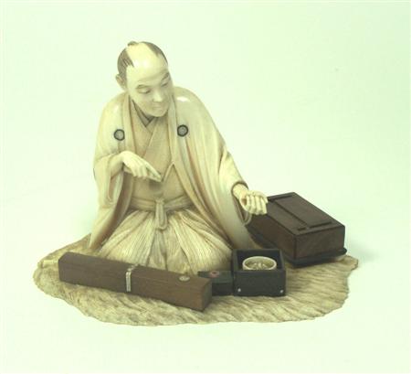 Appraisal: A Japanese ivory okimono of a sword maker Meiji period