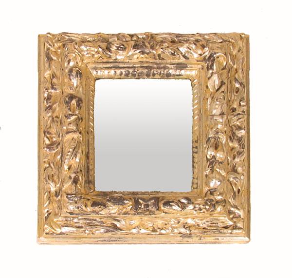 Appraisal: A silvered wood mirror in the Baroque style height in