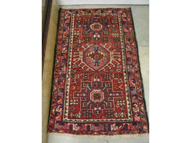 Appraisal: Heriz Persian Handmade Rug triple medallions red blues ivory '